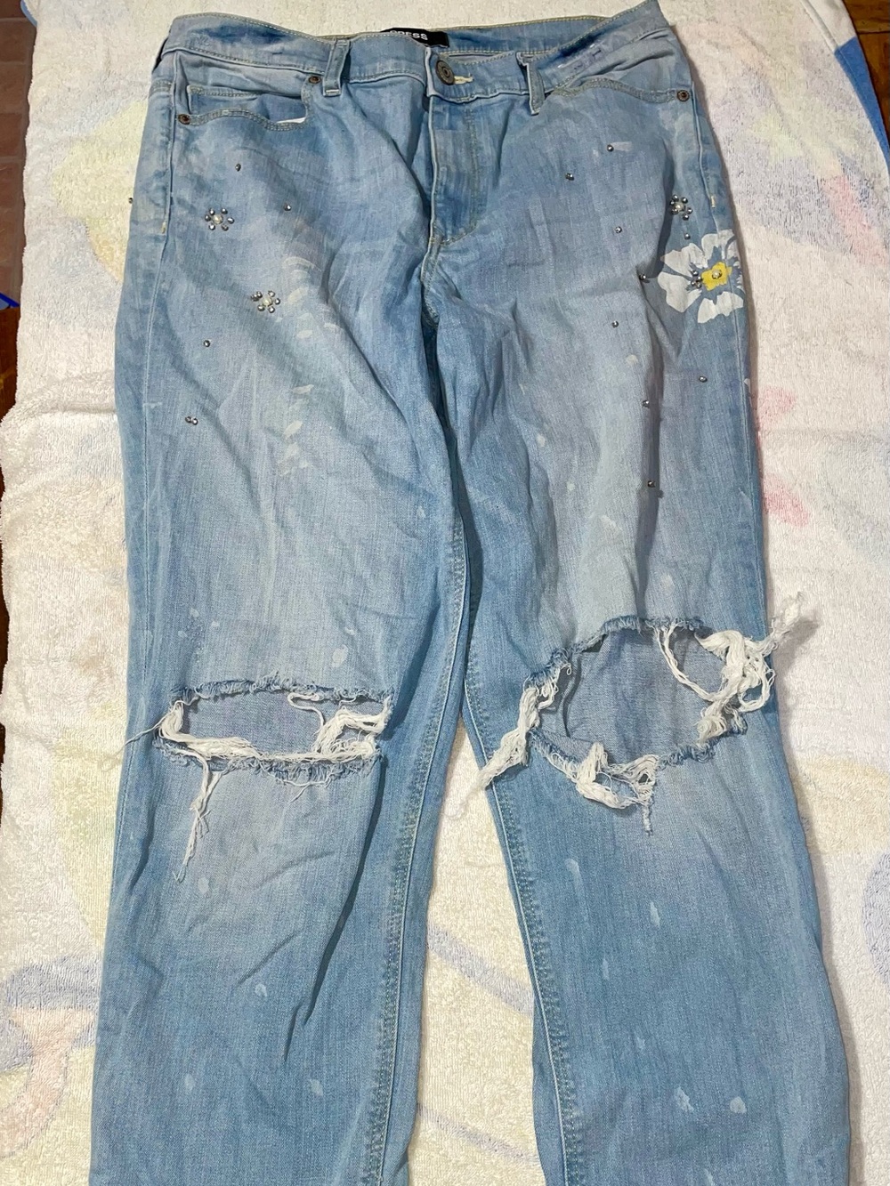 Express Light Blue Distressed Boyfriend Jeans with Floral Accent